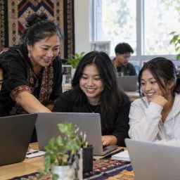 Southeast Asian youth learning AI and digital workforce skills with a community mentor